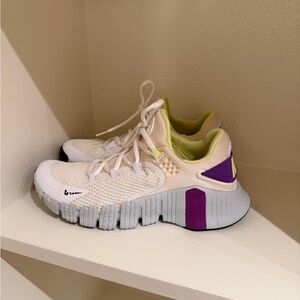 Nike Cream and Purple Athletic Shoes
